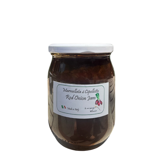 Jar of red onion marmalade with a label on a white background