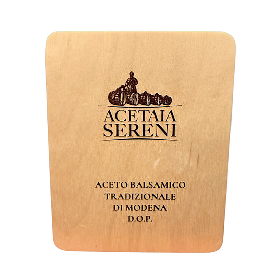 Wooden board with Acetaia Sereni logo and text on a white background