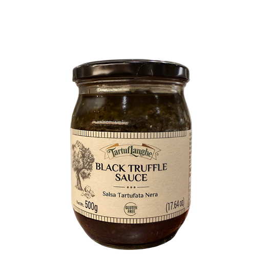 Jar of black truffle sauce with a label on a white background