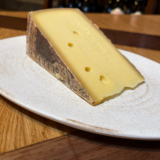 Wedge of Cheese on  A Plate
