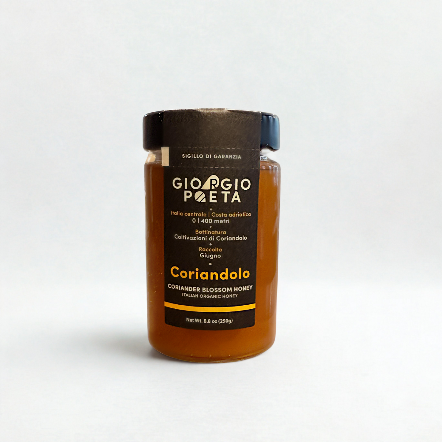 Jar of Giorgio Poeta Coriandolo honey on a white background
