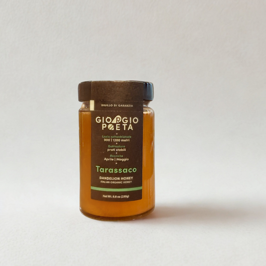 Jar of Giorgio Poeta Tarassaco honey on a white background
