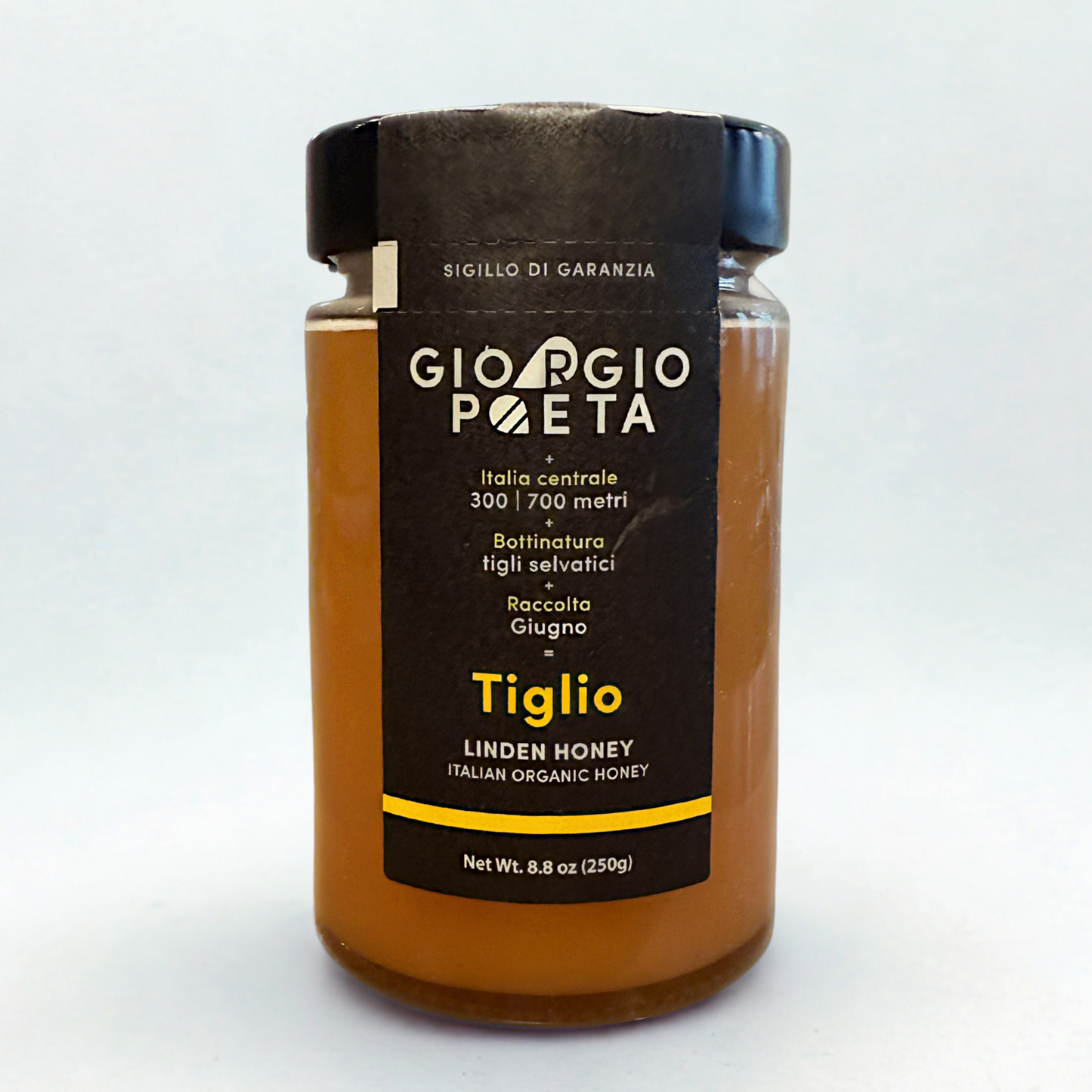 Jar of Giorgio Poeta honey on a white background
